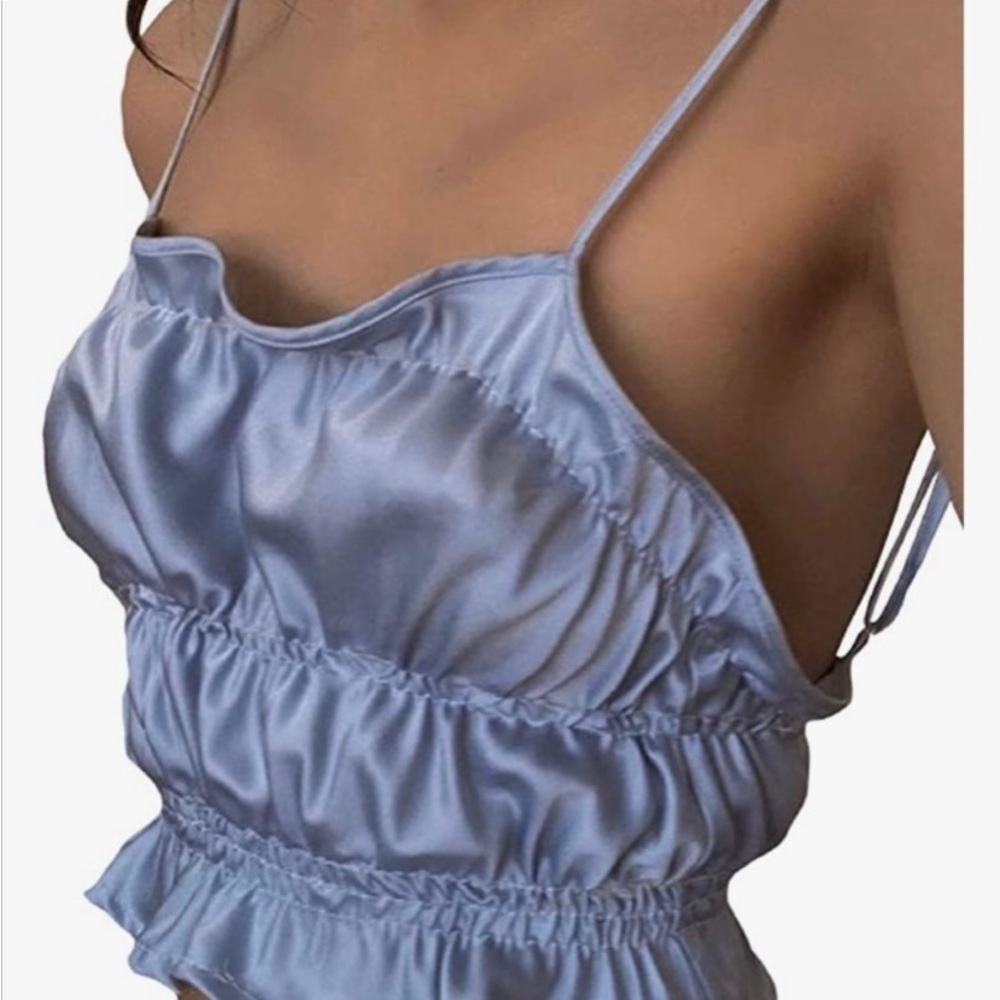 NWT Gorgeous blue medium crop top with adjustable straps. Price is FIRM!